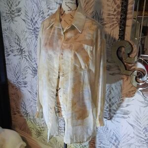 Elegant Cream Blouse With Soft Pastels